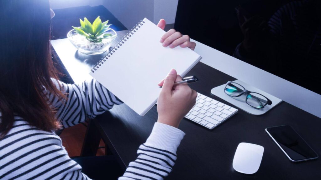 dry marketing copy Simple and clear writing with short sentences in a notebook